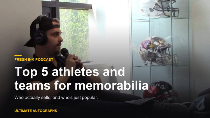 Fresh Ink podcast host on mic in the Ultimate Autographs studio beside a case of signed helmets