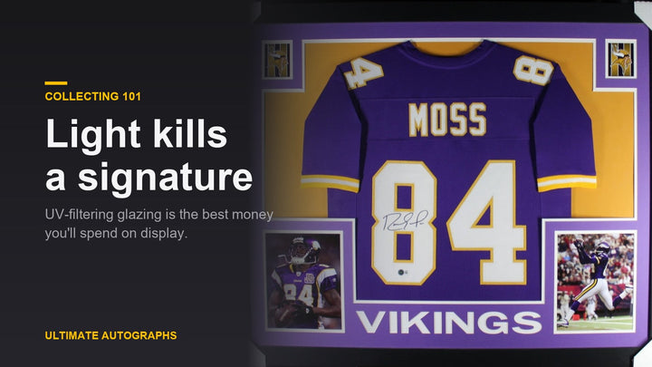Randy Moss signed Vikings jersey in a framed shadow box display