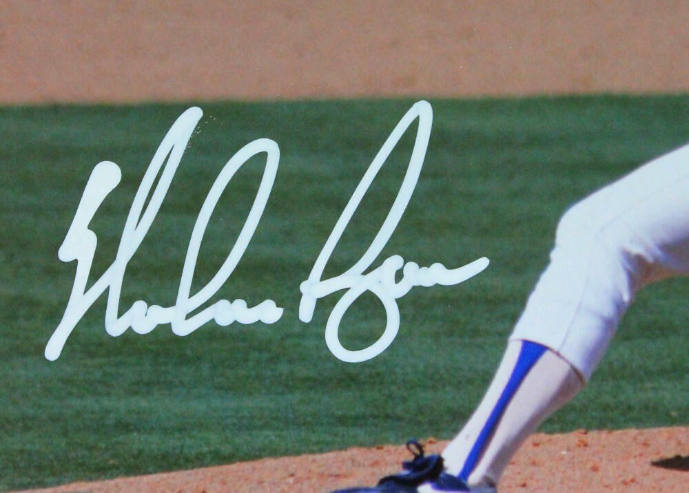 Nolan Ryan Signed Texas Rangers 8x10 Pitching Photo
