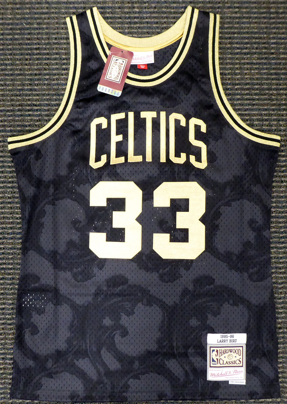 LARRY BIRD BOSTON CELTICS SIGNED BLACK M&N GOLD TOILE JERSEY M (BAS COA)