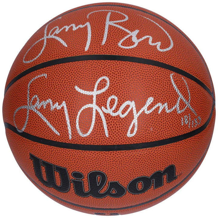Signed NBA basketball on a display stand
