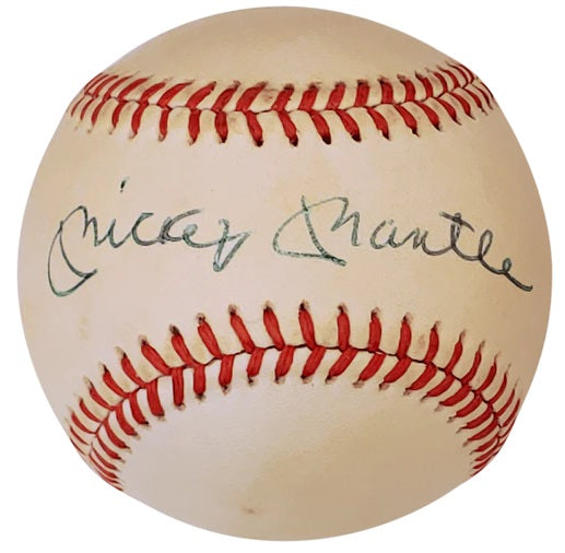 Baseball signed by Mickey Mantle resting in a display case