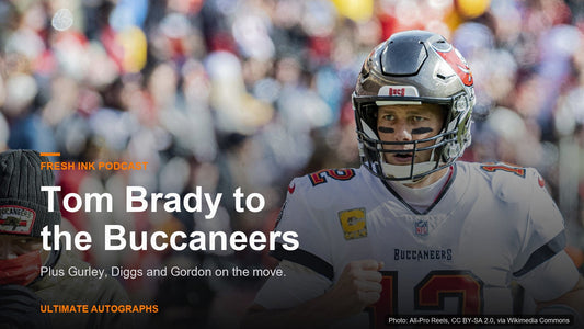 Tom Brady jogging onto the field in a Tampa Bay Buccaneers uniform