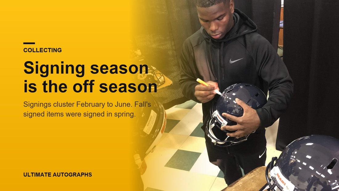 Tarik Cohen signing a Chicago Bears helmet at a private signing
