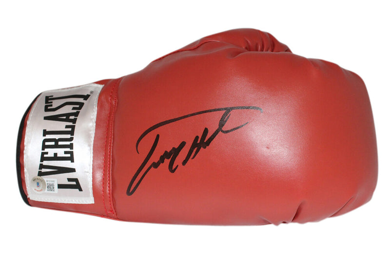 Larry Holmes Autographed Red Boxing Glove (Beckett COA)