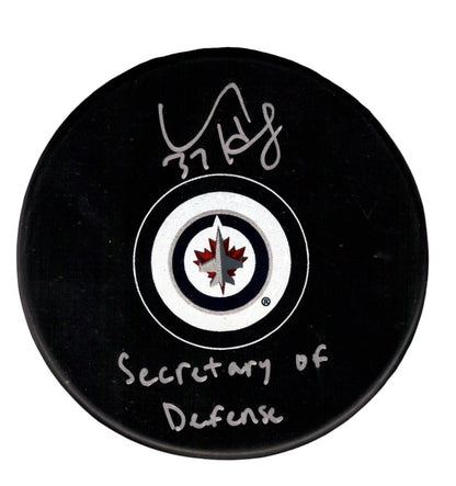 Connor Hellebuyck Signed Winnipeg Jets Logo Puck - Secretary of Defense