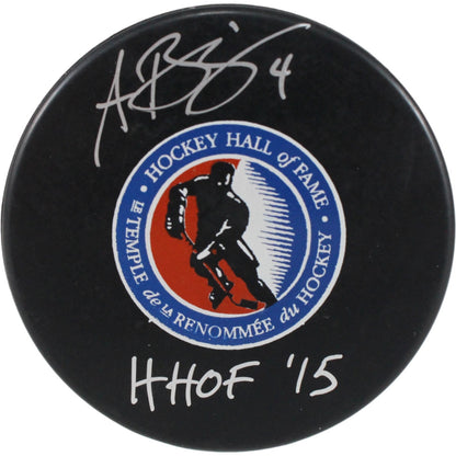 Angela Ruggiero Autographed Hockey Hall of Fame Logo Puck