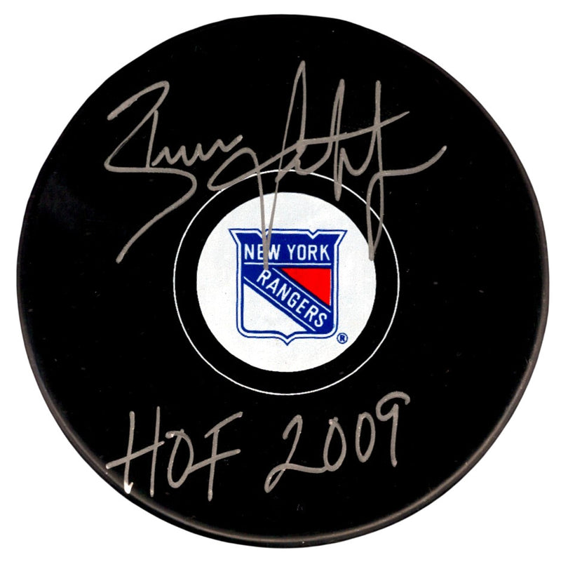Brian Leetch Signed New York Rangers Hockey Puck (HOF 2009 Inscription)