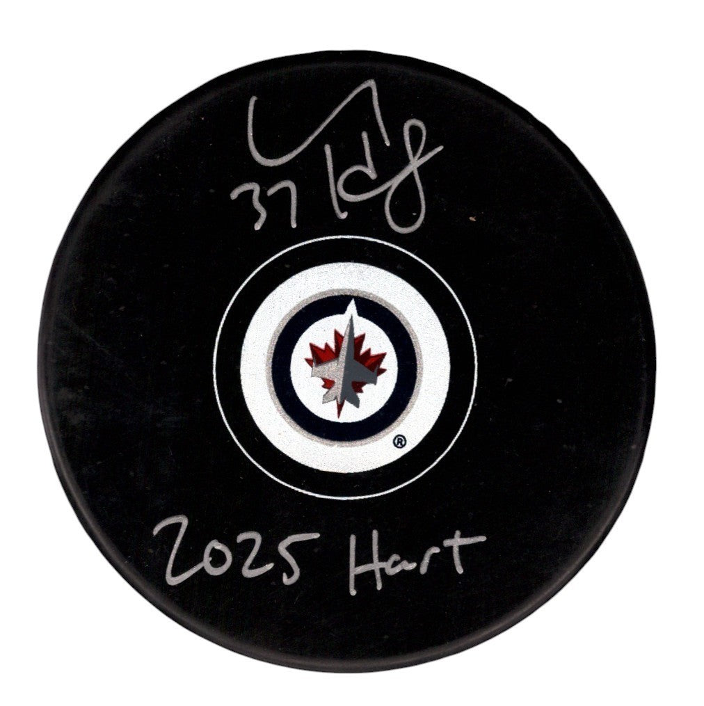 Connor Hellebuyck Signed Winnipeg Jets Logo Puck - 2025 Hart Inscription
