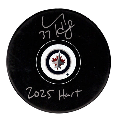 Connor Hellebuyck Signed Winnipeg Jets Logo Puck - 2025 Hart Inscription
