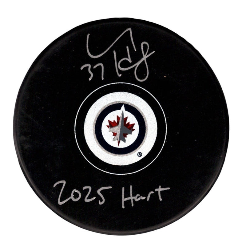 Connor Hellebuyck Signed Winnipeg Jets Logo Puck - 2025 Hart Inscription