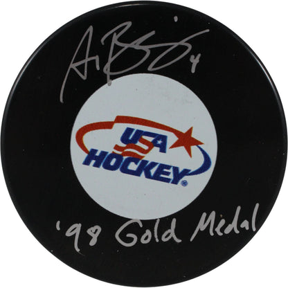 Angela Ruggiero Signed USA Logo Hockey Puck (98 Gold Medal Inscription)