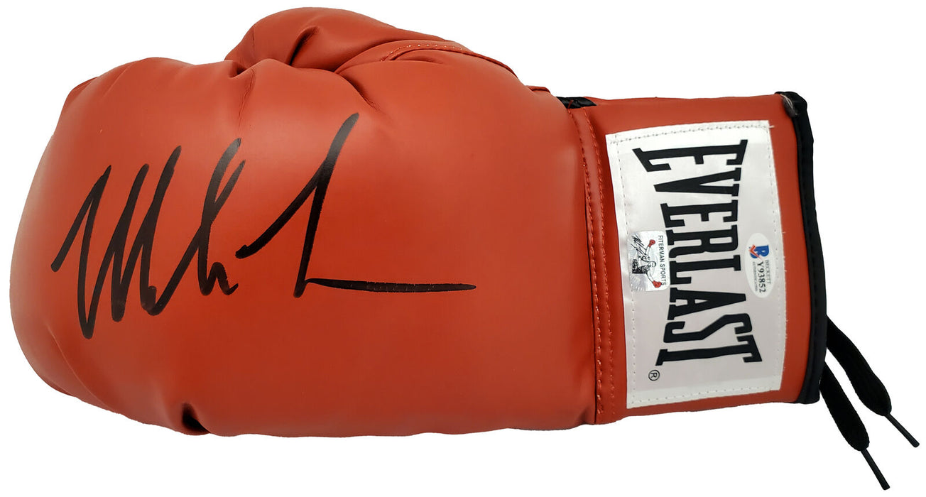MIKE TYSON SIGNED RED EVERLAST BOXING GLOVE LH IN BLACK (BAS COA)