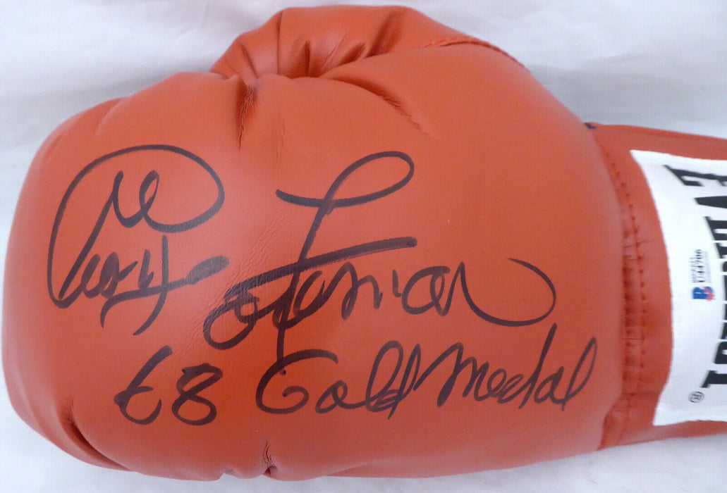 GEORGE FOREMAN SIGNED BOXING GLOVE LH "68 GOLD MEDAL" (BAS COA)